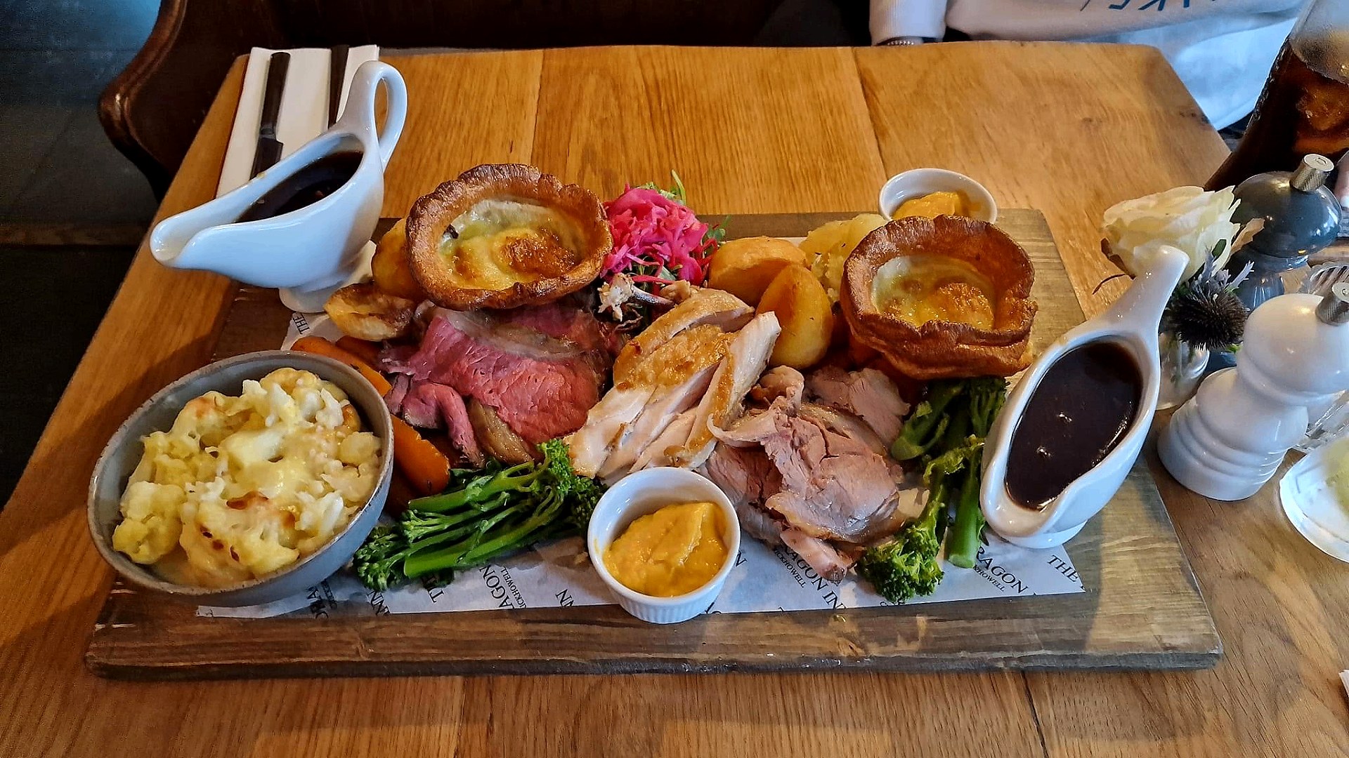 Welsh topside of beef, Yorkshire pudding, maple carrots, roast potatoes and rich gravy.